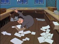 Willie frantically searching for the money envelope.