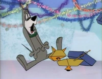 Astro is surprised to find his present is a robot cat.