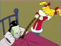 Angelica stealing Zim's chocolate candy cane.