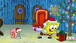 SpongeBob leaves a gift for Santa under his tree in "SpongeBob's Road to Christmas".