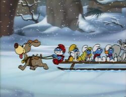 Smurfs riding a sled.jpg