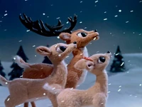 Imagedmdc.jpg (203 KB) Rudolph's parents and Clarice watching Rudolph guiding Santa's sleigh.