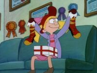 Helga receives a pair of the snow boots...