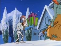 Jim presents the Queen with a soon-to-explode gift box.