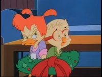 Gosalyn and Honker get tied up in a wreath trying to stop the tree.