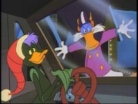 Darkwing lands right on Bushroot's windshield.