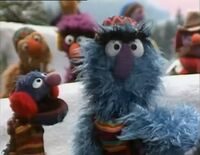 Grover with Herry Monster in A Muppet Family Christmas.
