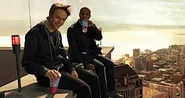 Andrew with Steve drinking smoothies at the top of a building
