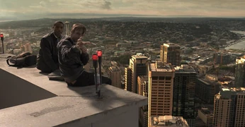Steve and Andrew hanging out on the top of a building 