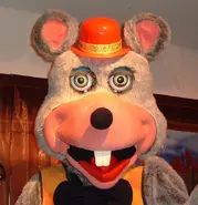 The animatronic with a orange vest