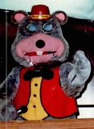 The animatronic with a red vest