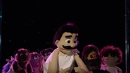 Various whatnot puppets as background dancers in "It's the 70s"