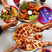 Promotional image showing the food offerings at Chuck E. Cheese.