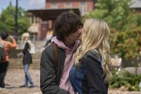 Grant kissing Lexy.