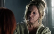 Sarah looking at the Chucky doll in Curse of Chucky.