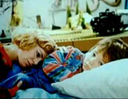 4A13E3B3-7AA7-49C0-B6F3-89FDAC9CC756.jpeg (42 KB) Karen comforting Andy in his bed.