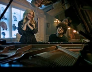 Grant playing the piano for Lexy in the Chucky episode Panic Room.