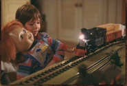 705B5D62-5006-45E2-A160-A30BBB7E5FA0.jpeg (78 KB) Andy shows Chucky the train set in his bedroom.