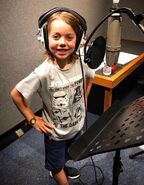 Avi Le Brocq recording for the singing voice of Brewster in the UK Dub