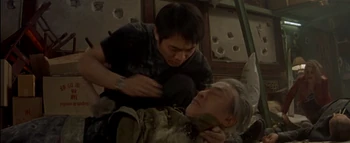 Burt Kwouk (down) in Kiss of the Dragon