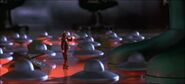 A shrunken Rod Steiger about to be crushed, in Mars Attacks