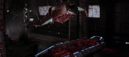 Jason Isaacs (hanging) in Event Horizon
