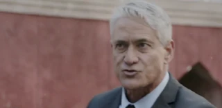 Greg Louganis just before his death in Sharknado 5: Global Swarming