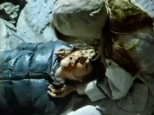 Maggie Cooper moaning in pain sometime before her death in TV movie I Alone Survived (1978)