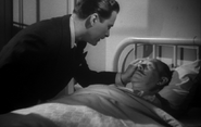 Paul E. Burns (in bed) in The Mummy's Tomb