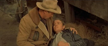 Audie Murphy (in 's arms) in Night Passage