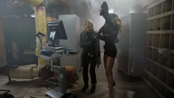 Olivia Newton John (left) last seen in Sharknado 5: Global Swarming