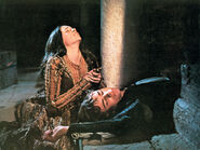 Olivia Hussey (left, stabbing herself) in Romeo and Juliet