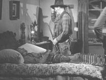 John Ireland (on bed) in My Darling Clementine