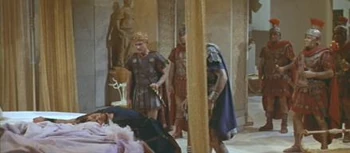 Cesare Danova (on bed) with Roddy McDowall in Cleopatra