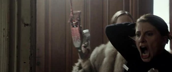 Mia Barron (foreground) with  (background) just before Mia's death in Amnesiac