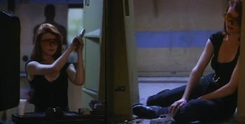 Beth Broderick getting shot in The Silencer (1) Beth Broderick dead in The Silencer (2)
