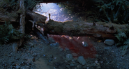 His blood flowing in the river in The Lost World: Jurassic Park