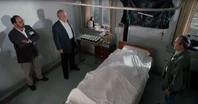 Ed Flanders (in bed) in The Exorcist III