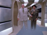 Harvey Jason (right, with Laurence Tierney) caesing to exist in Star Trek: The Next Generation: The Big Goodbye