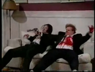Chris Farley (right, with Chris Elliott) in SNL (10-15-1994)