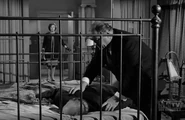 Vaughn Taylor dead (on bed) in Perry Mason: The Case of the Witless Witness