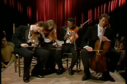 Chevy Chase (far right) about to die on SNL (1-20-1976)
