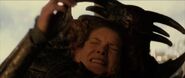 Rene Russo (with Adewale Akinnuoye-Agbaje) in Thor: The Dark World