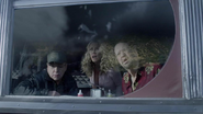 Teller (far left) right before the shark attacks in Sharknado 3: Oh Hell No!