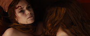 Isla Fisher (with Ellie Bamber) in Nocturnal Animals
