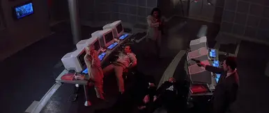 Jimmy Roussounis (sitting in chair) in The World is not enough 