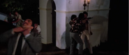 Arnaldo Santana (left, front) in Scarface