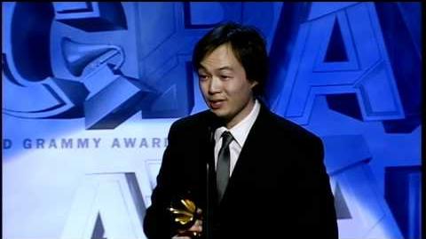 Tin winning a Grammy for Best Instrumental Arrangement Accompanying Vocalists