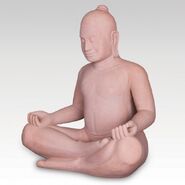A statue of Jayavarman VII in meditation (which appears to have inspired his in-game model)
