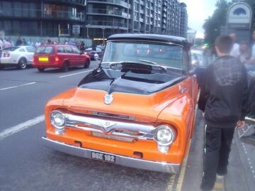 Orange and black pickup